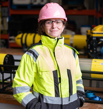 Petra Rybanska wearing a pink hard hat and high vis jacket